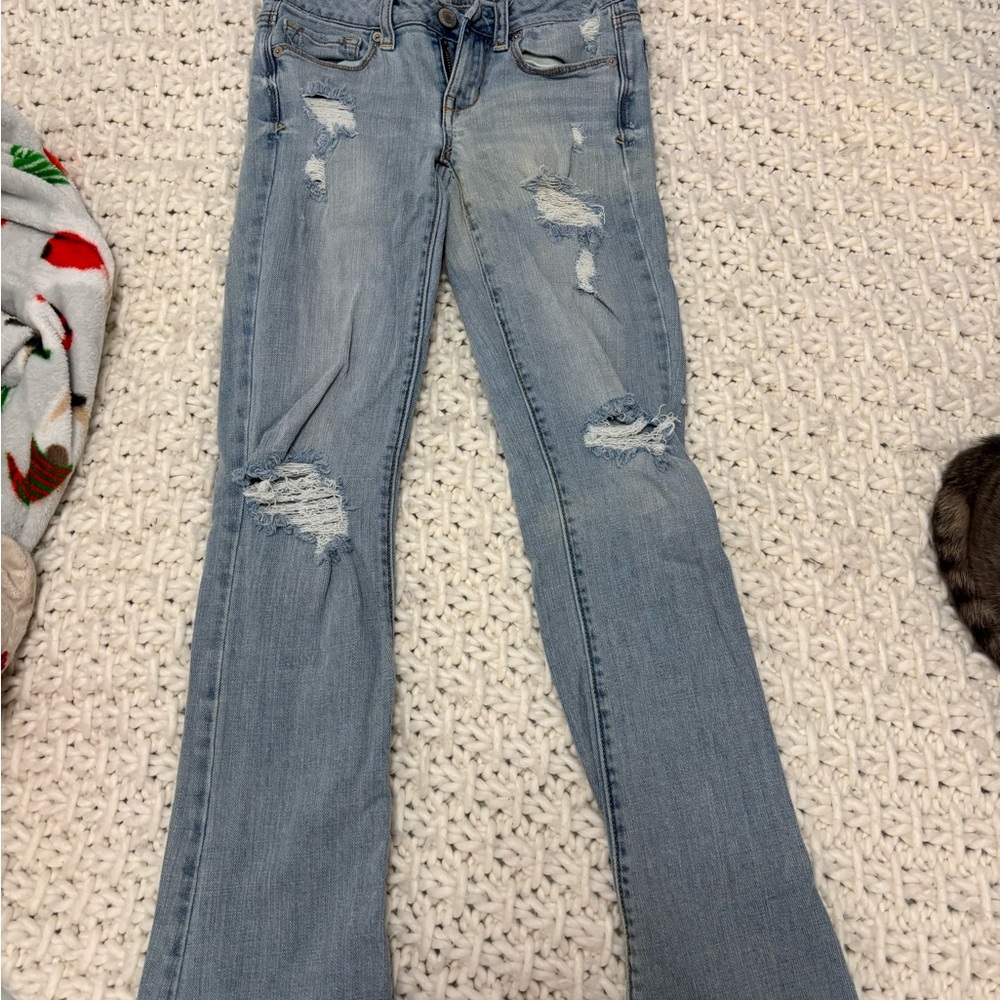 Women's Light Blue Distressed Jeans